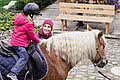 Kind auf Pferd wird geführt, im Hotel Unterschwarzachhof