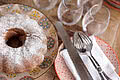 Set table and Bundt cake on the Alpine pasture, Hotel Unterschwarzachhof